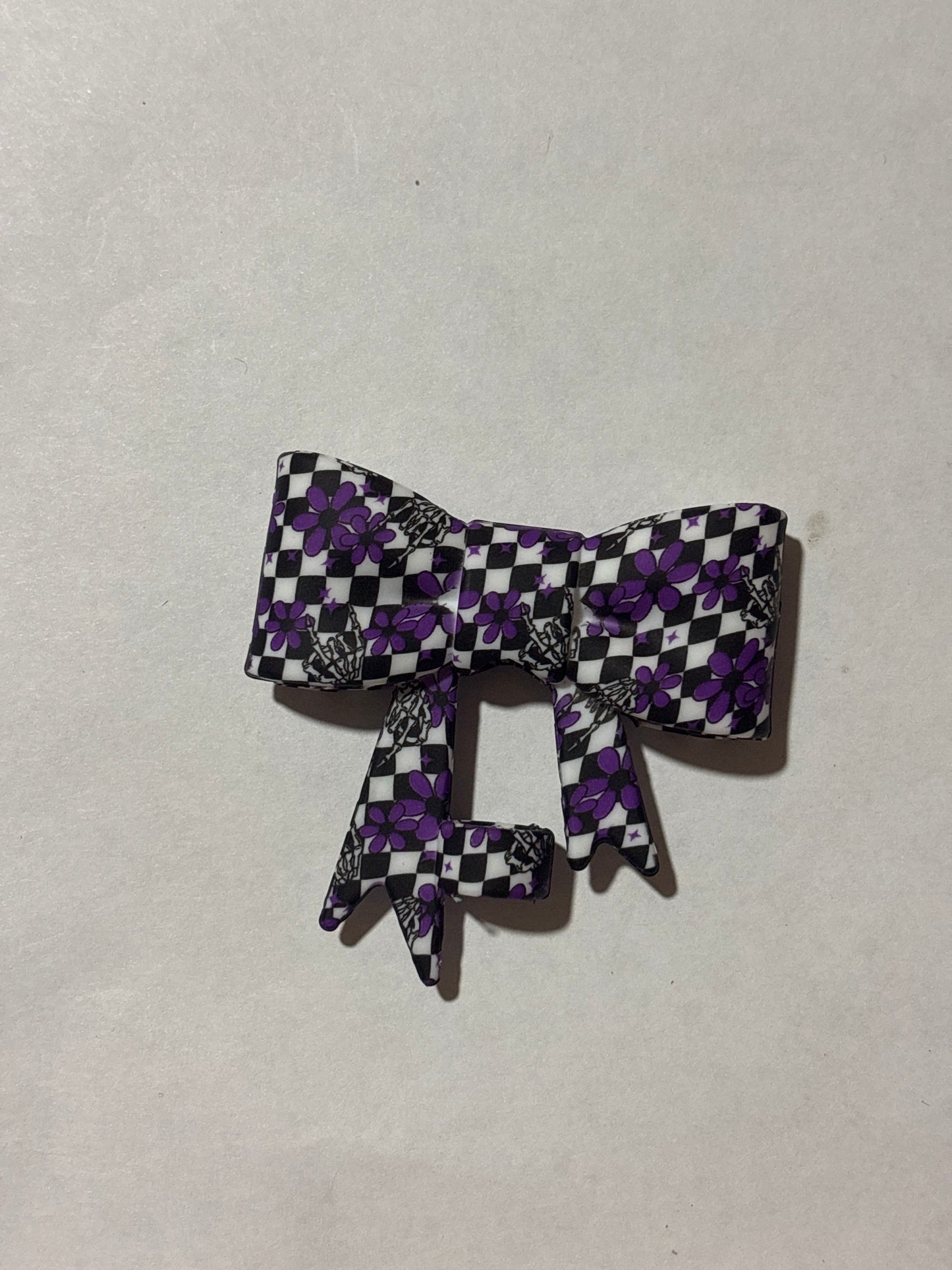 Purple skull checked silicone bow (C2)