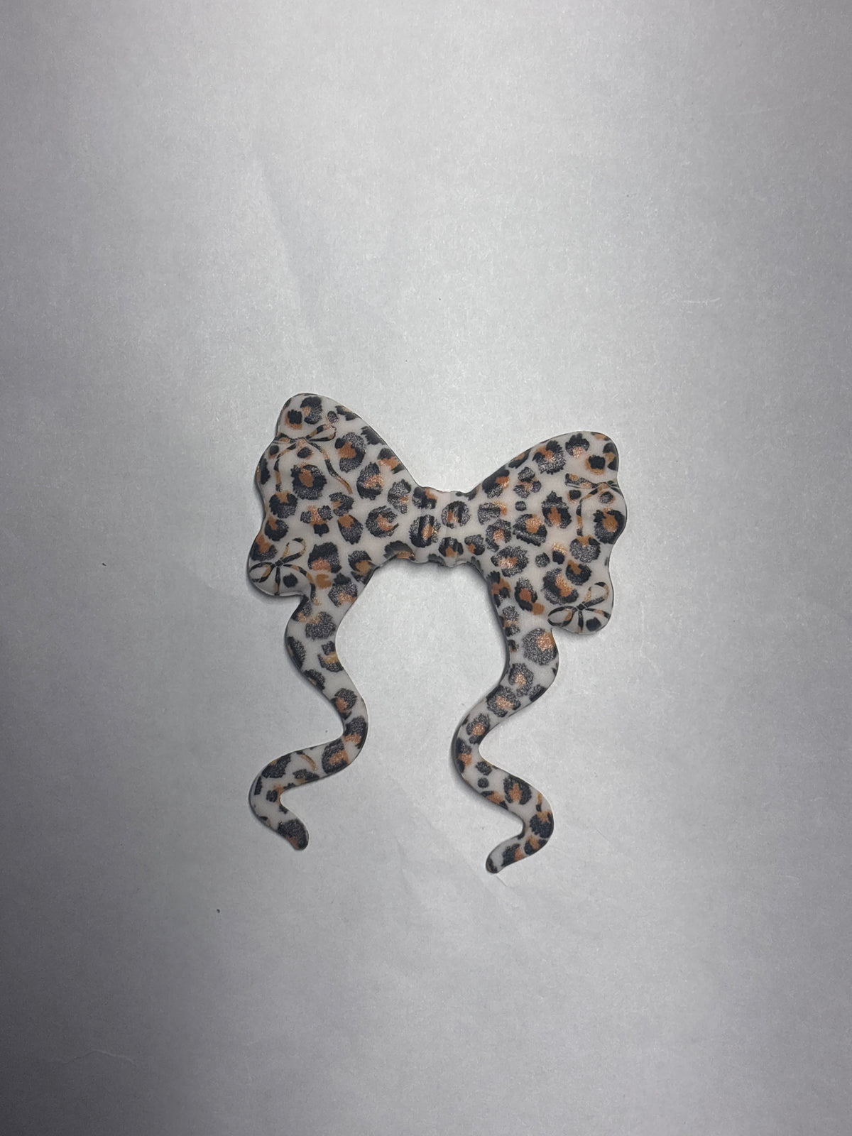 Brown cheetah flat silicone bow