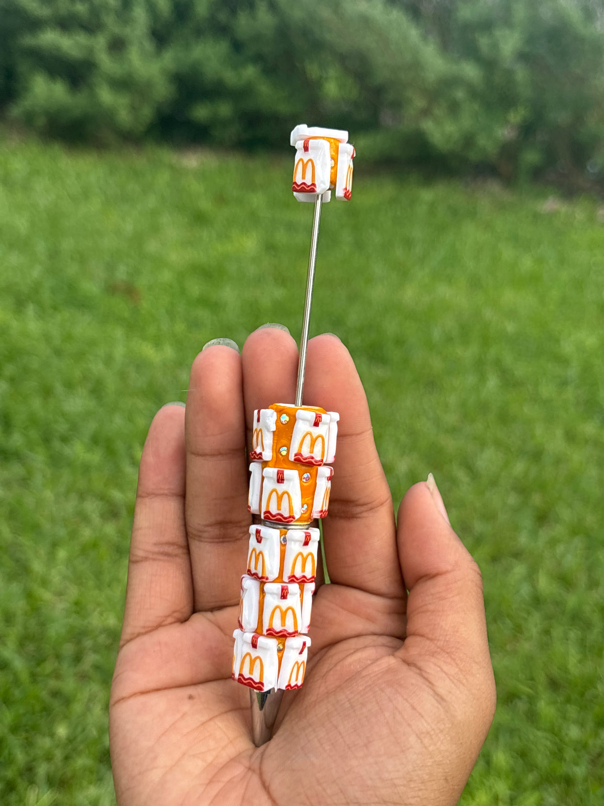 White & orange McDonalds clay beadable rhinestone pen #72