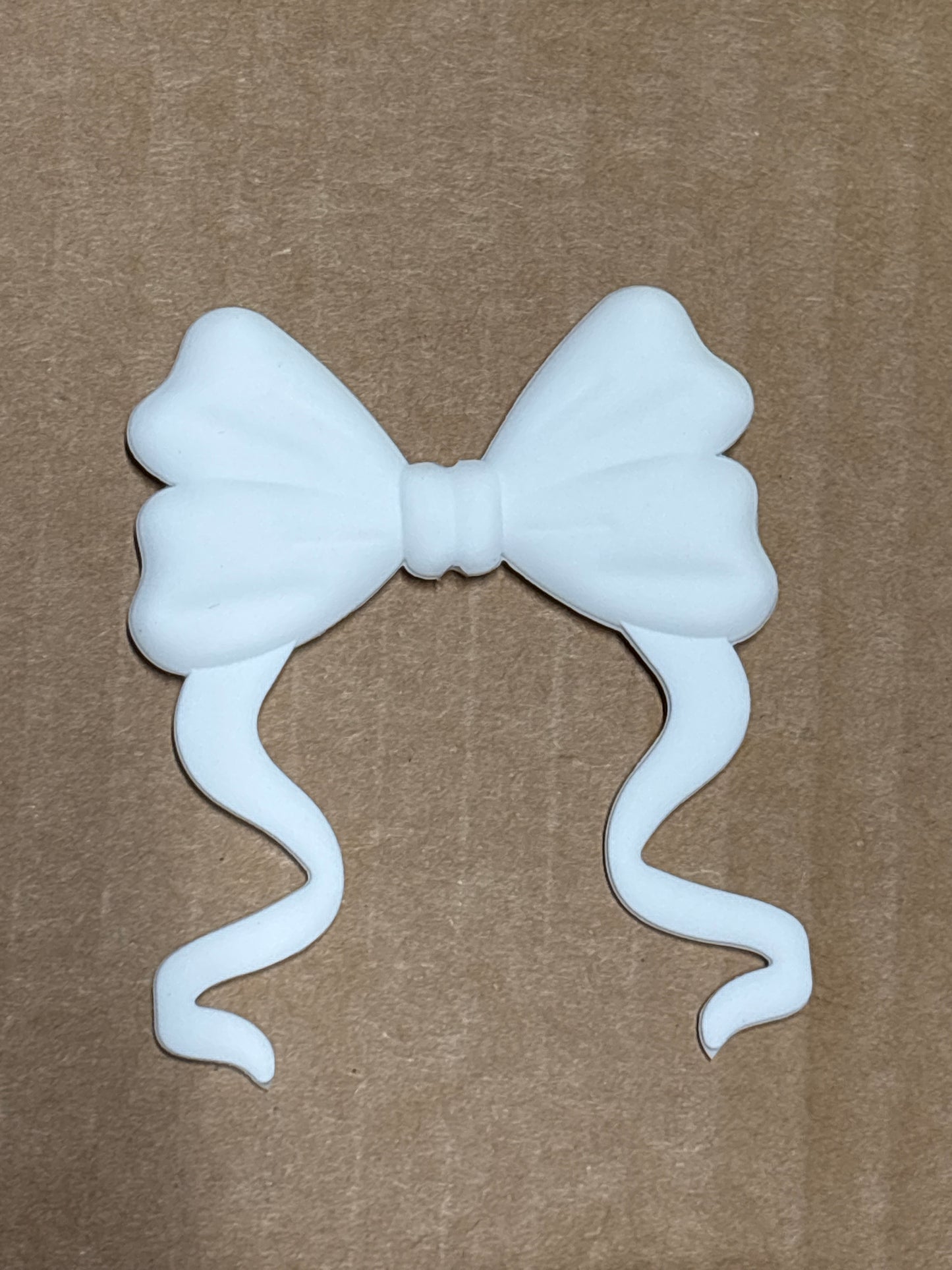 White silicone flat bow