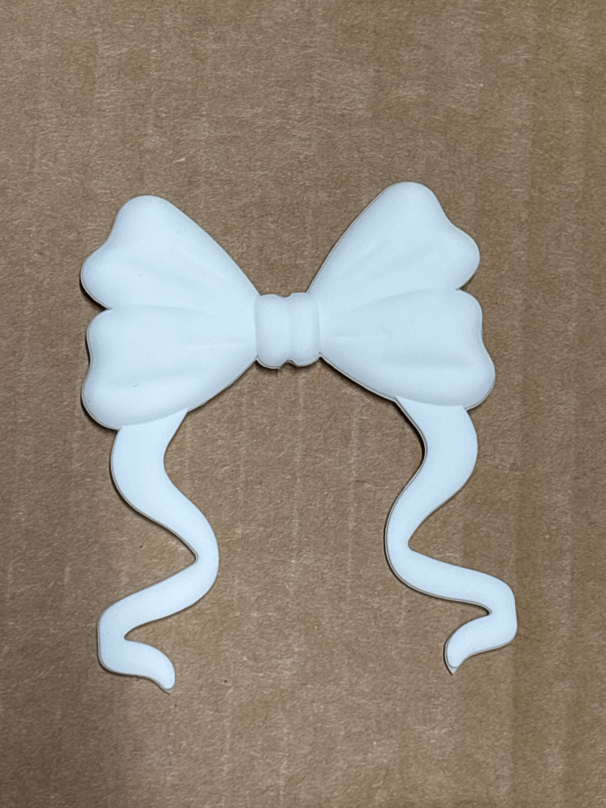 White silicone flat bow