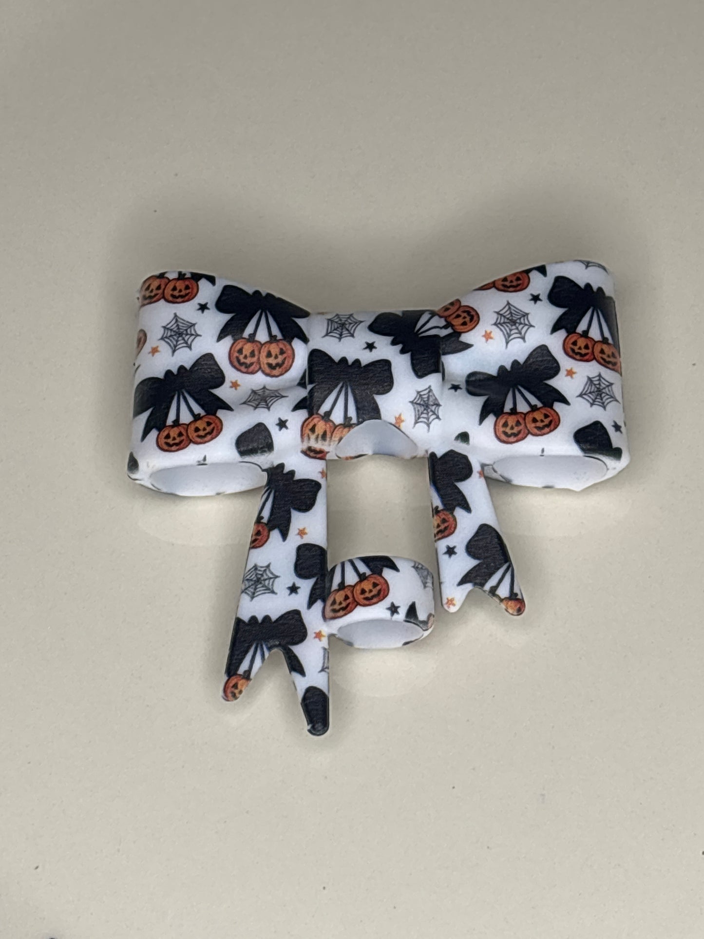 Pumpkin cherries with a black bow silicone straw topper bow