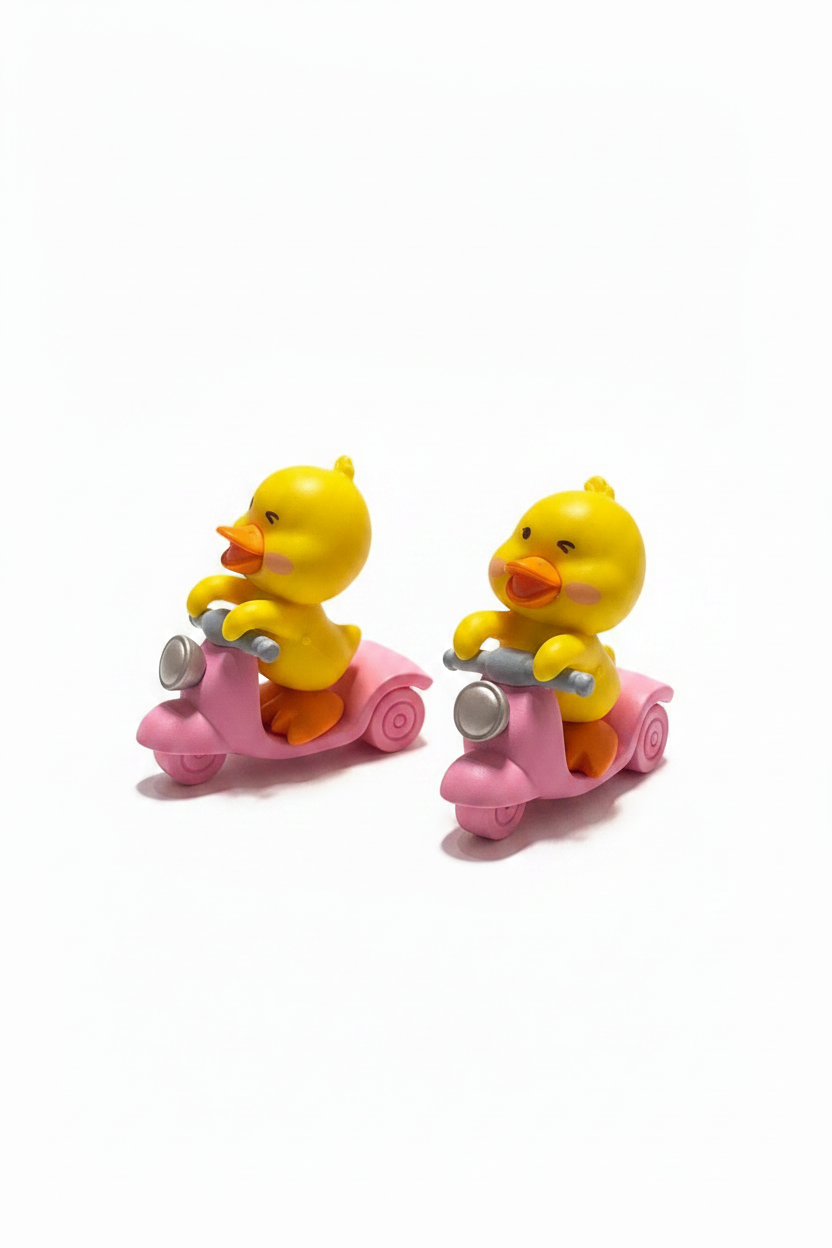 (159)Duck on scooter figure