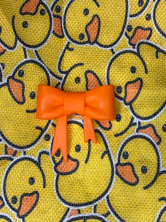 Ms. Orange silicone bow