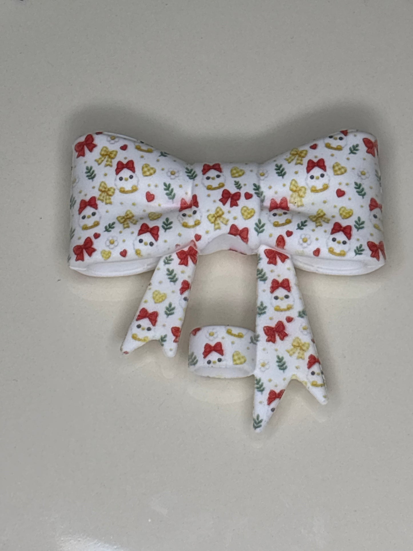 White chick with a red bow silicone straw topper bow