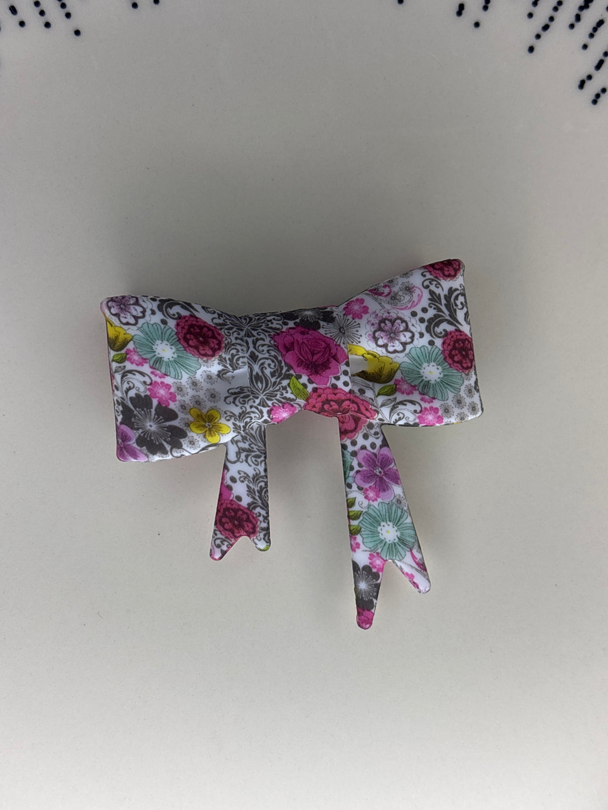 Colorful flowers with a hit of black straw topper bow #100