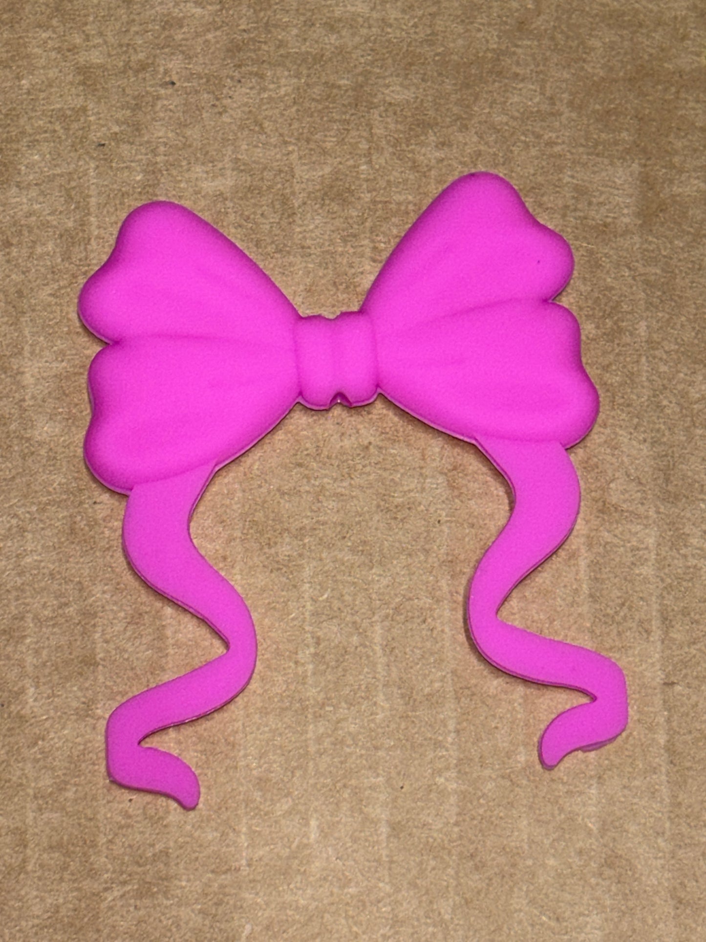 Pink silicone flat bow