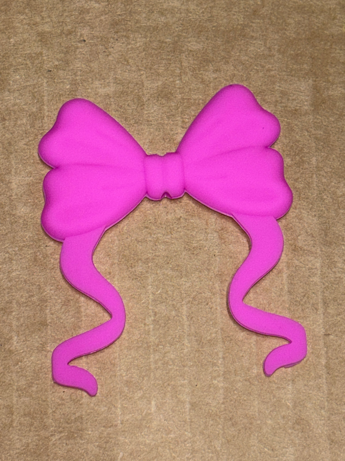 Pink silicone flat bow
