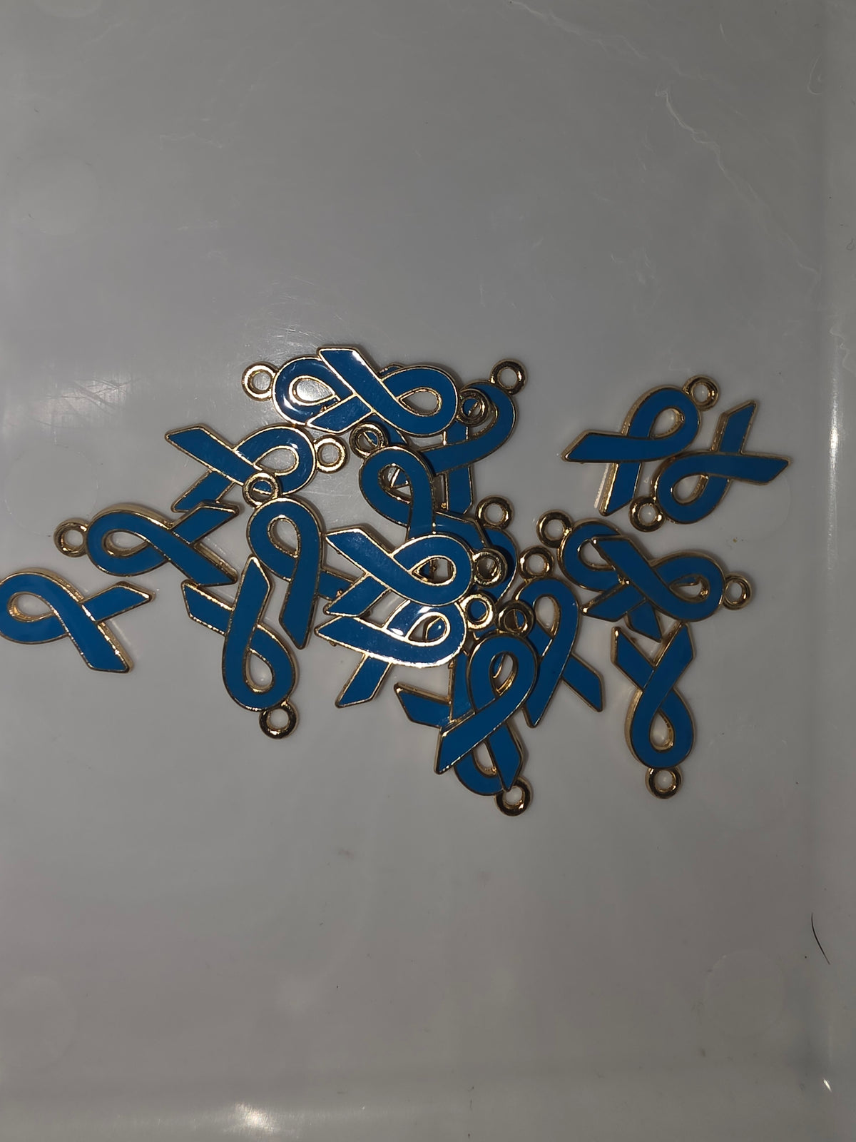 Blue ribbon charm #104